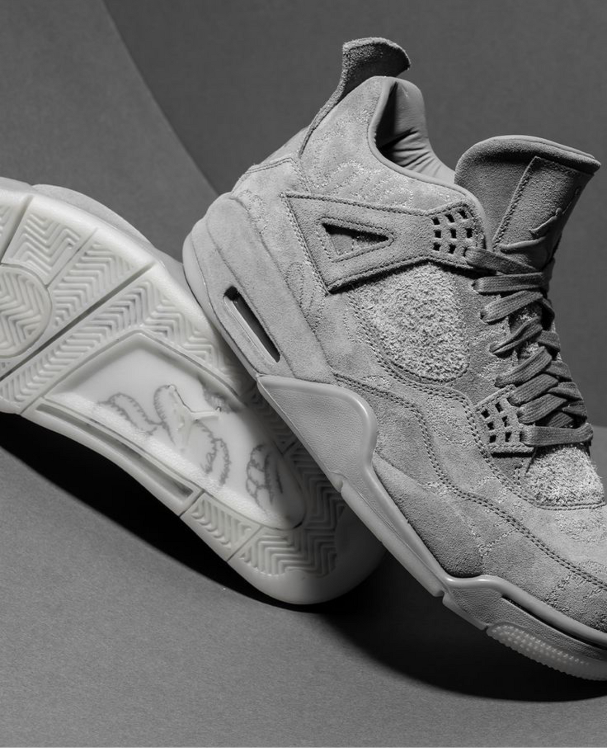 Air Jordan 4 Retro x KAWS “Cool Grey”