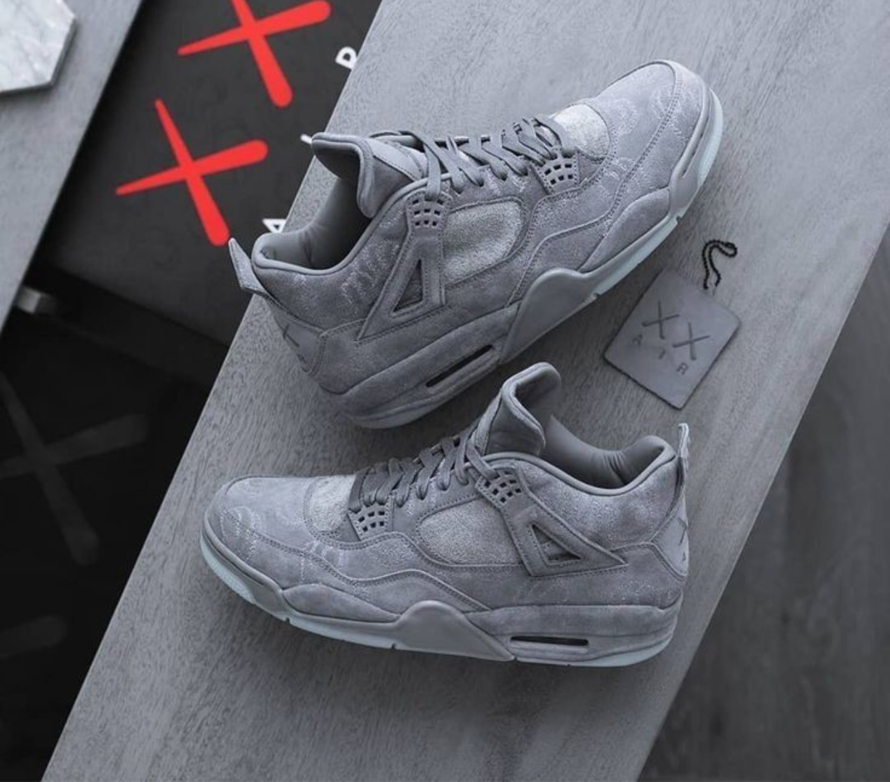Air Jordan 4 Retro x KAWS “Cool Grey”